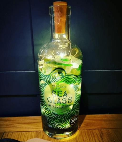 Sea Glass Gin bottle with lights